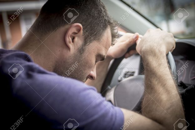 Young owner man with his car